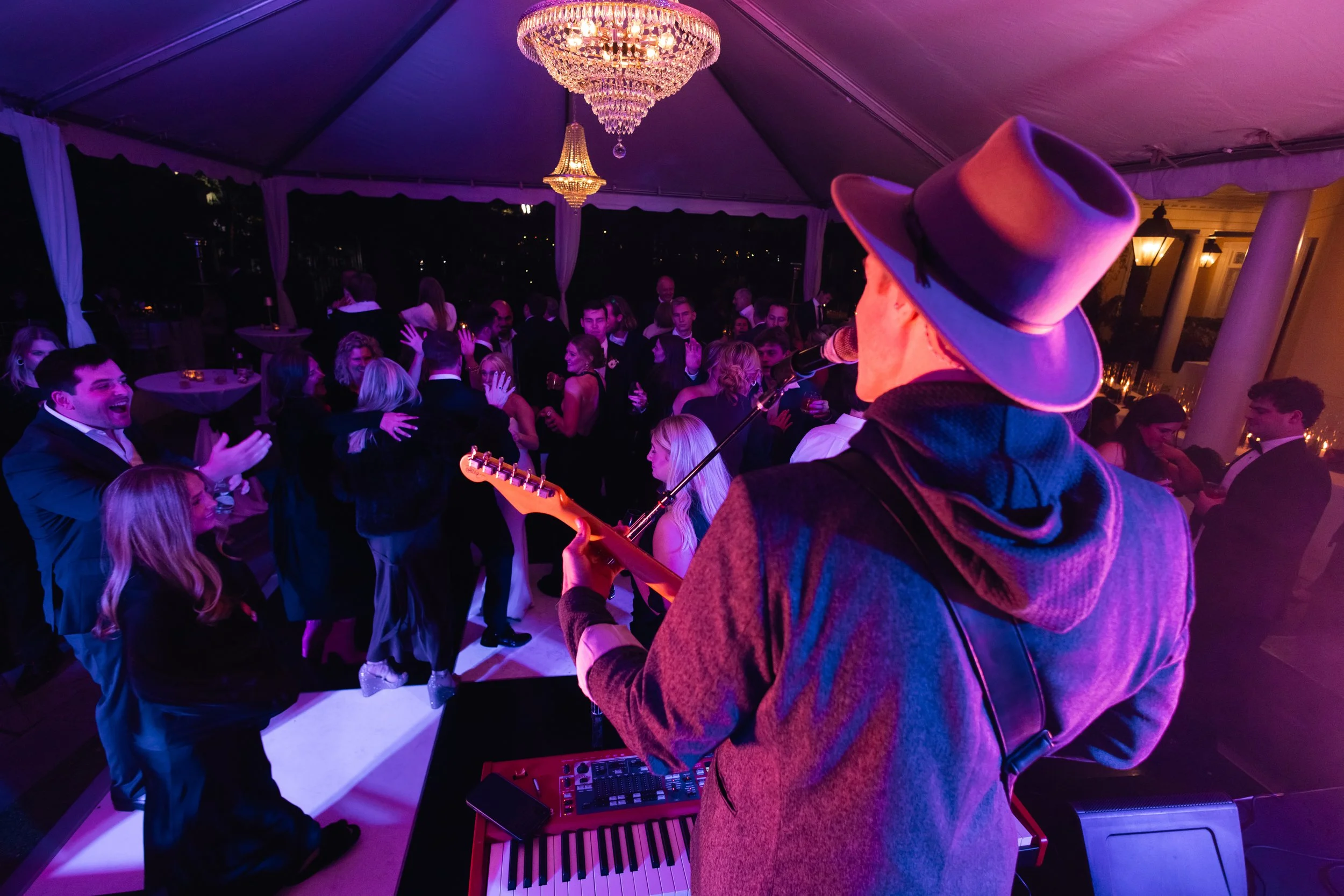 Zach Bedell performing live music at an event